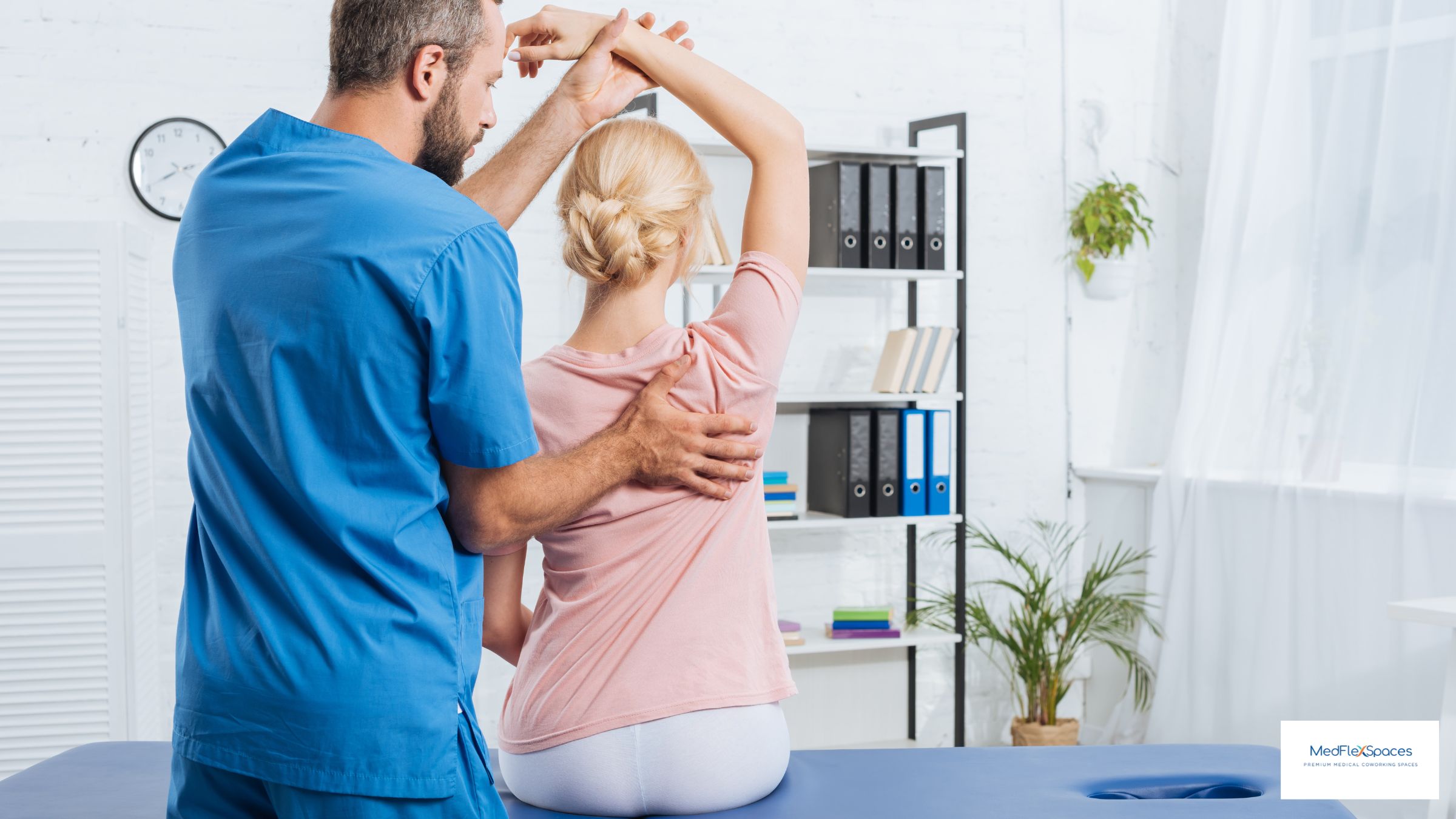 Chiropractor working with a patient in a dedicated MedFlex Spaces treatment room in Sugar Land TX